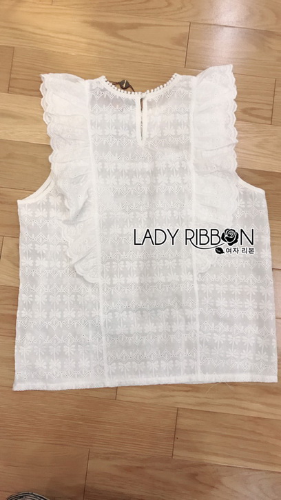 เสื้อแขนกุดผ้าคอตตอนสีขาวปักลายตกแต่งระบาย