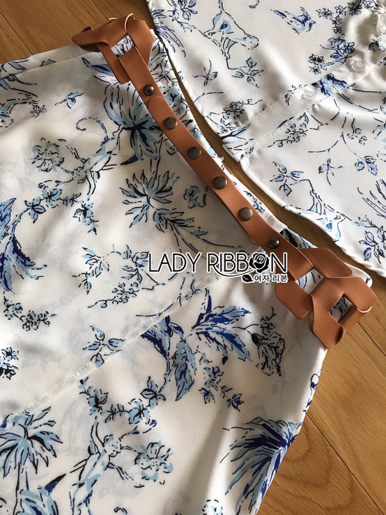 เซ็ตแขนกุดตกแต่งระบายและกางเกงขาสั้นสีขาว