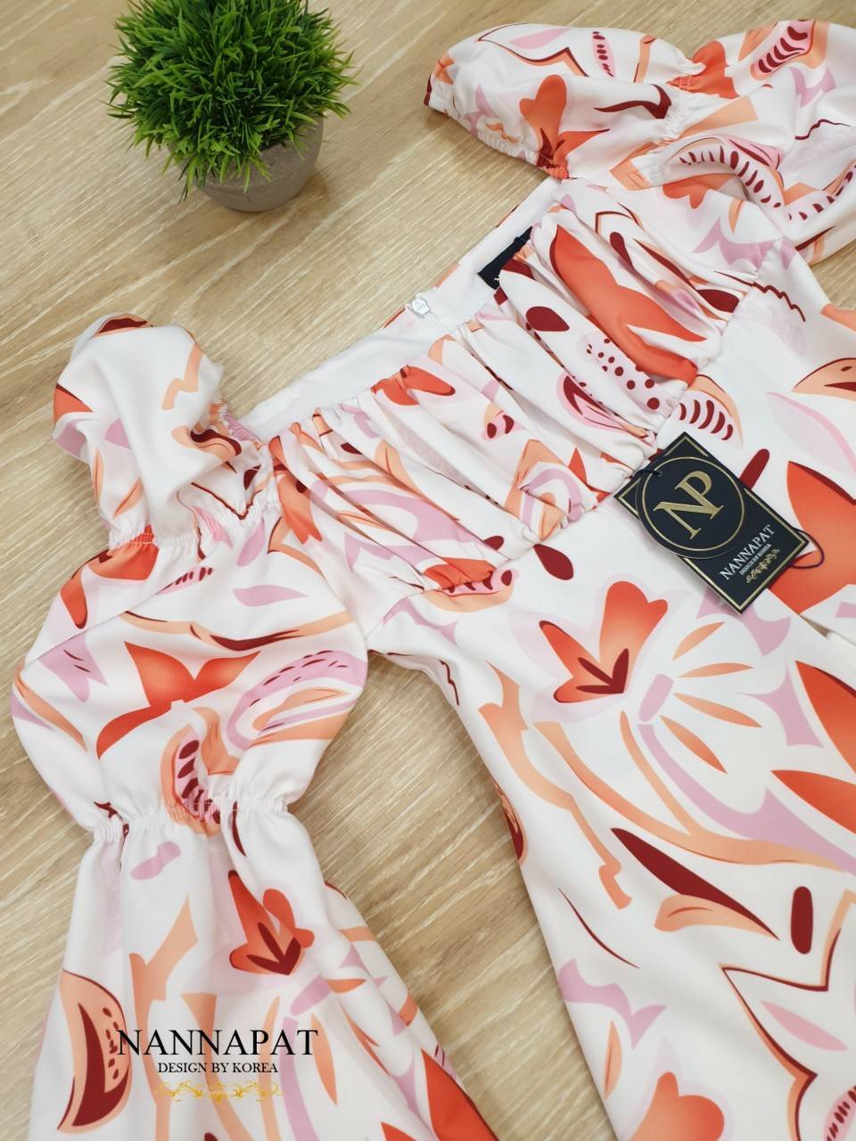 เสื้อผ่าหน้า ช่วงแขนเป็นสม็อค