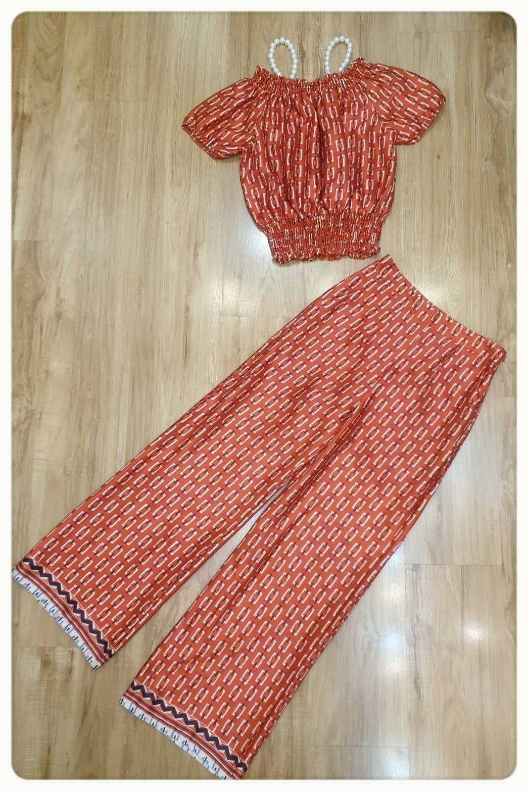 เสื้อเกาะใหล่ขอบยาง