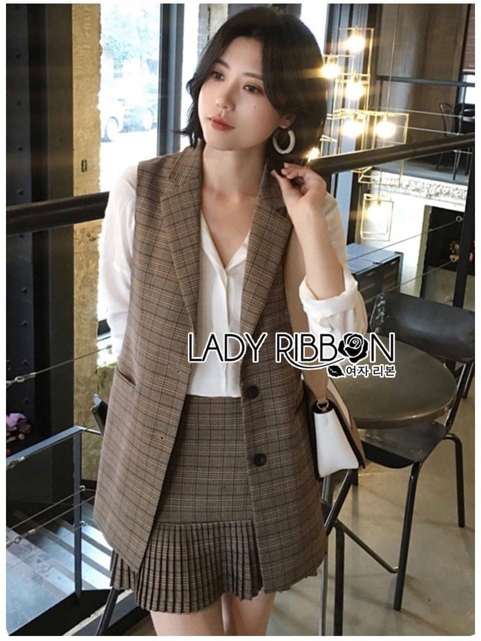 เซ็ตเสื้อสูทแขนกุดและกระโปรงแบบเข้าชุด