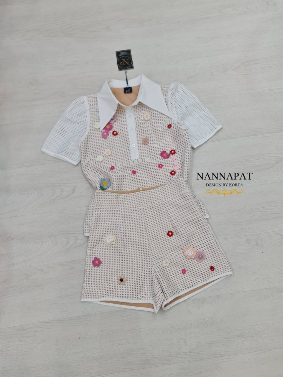 เสื้อกระดุมหน้าดอกไหมพรหม
