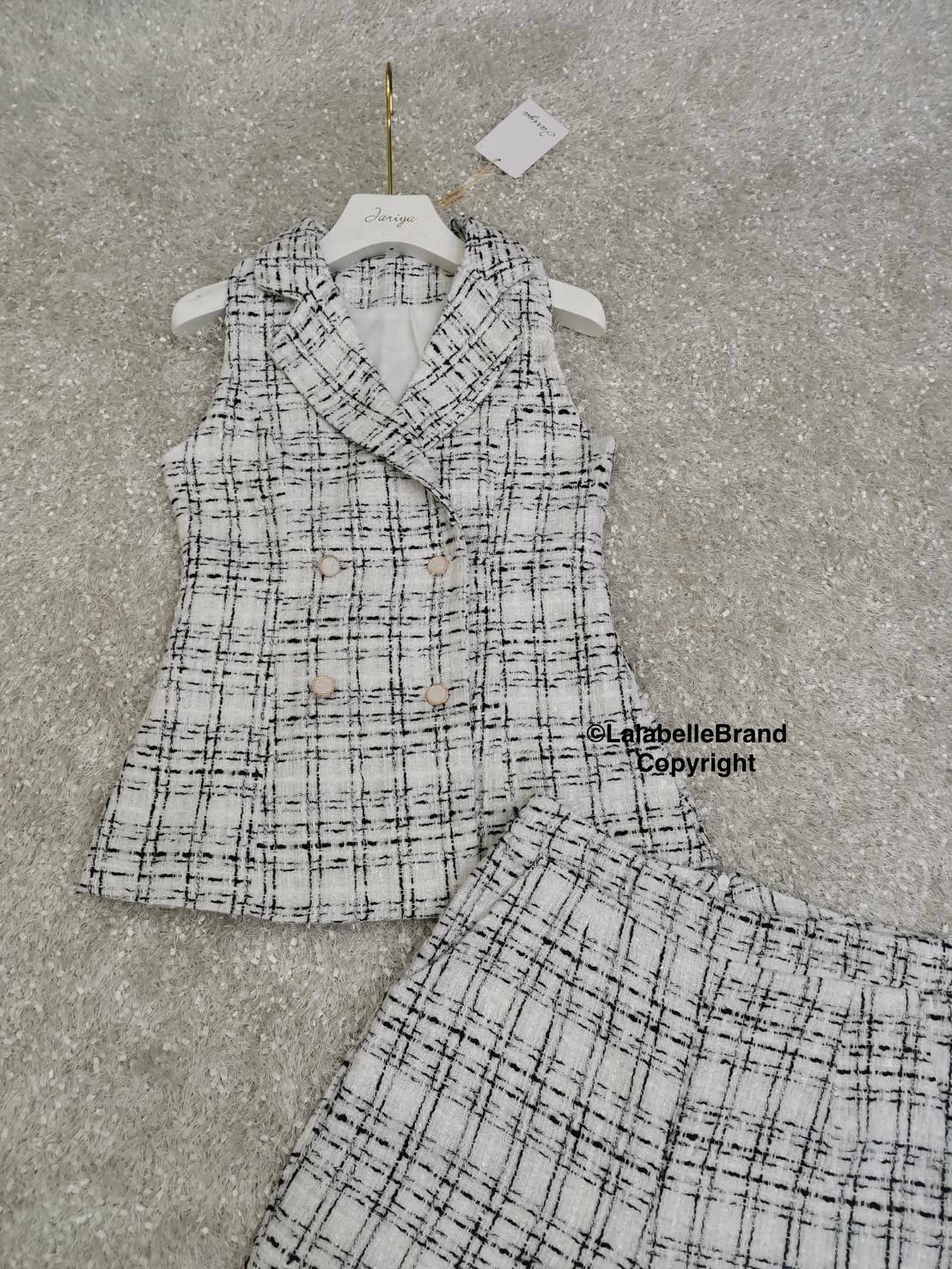 ผ้าดิ้นวิ้งเสื้อสูทแขนกุดคอปกกระดุมหน้า