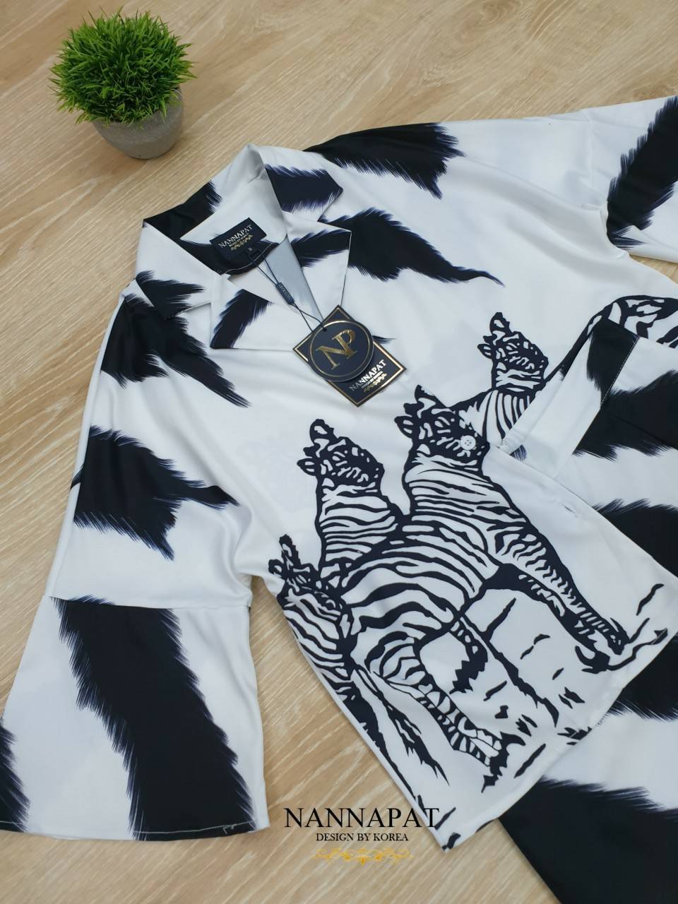 เสื้อกระดุมหน้า แขนบาน