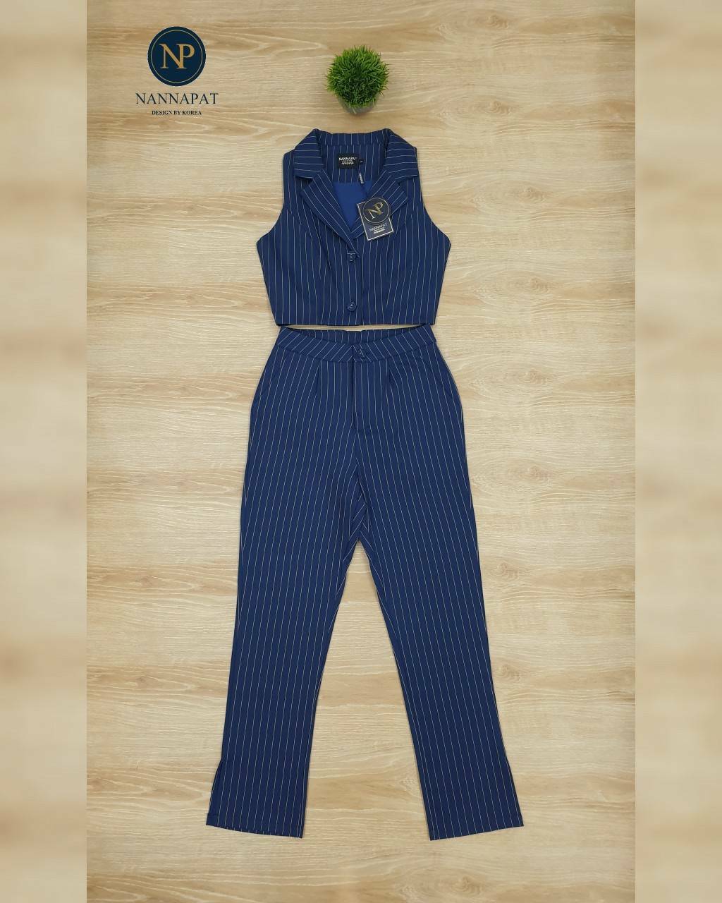 เสื้อแขนกุด คอปกกระดุม