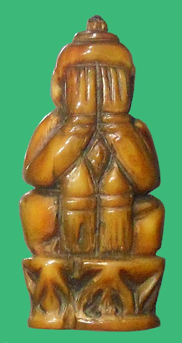 พระปิดตาเขี้ยวเสือแกะเก่า