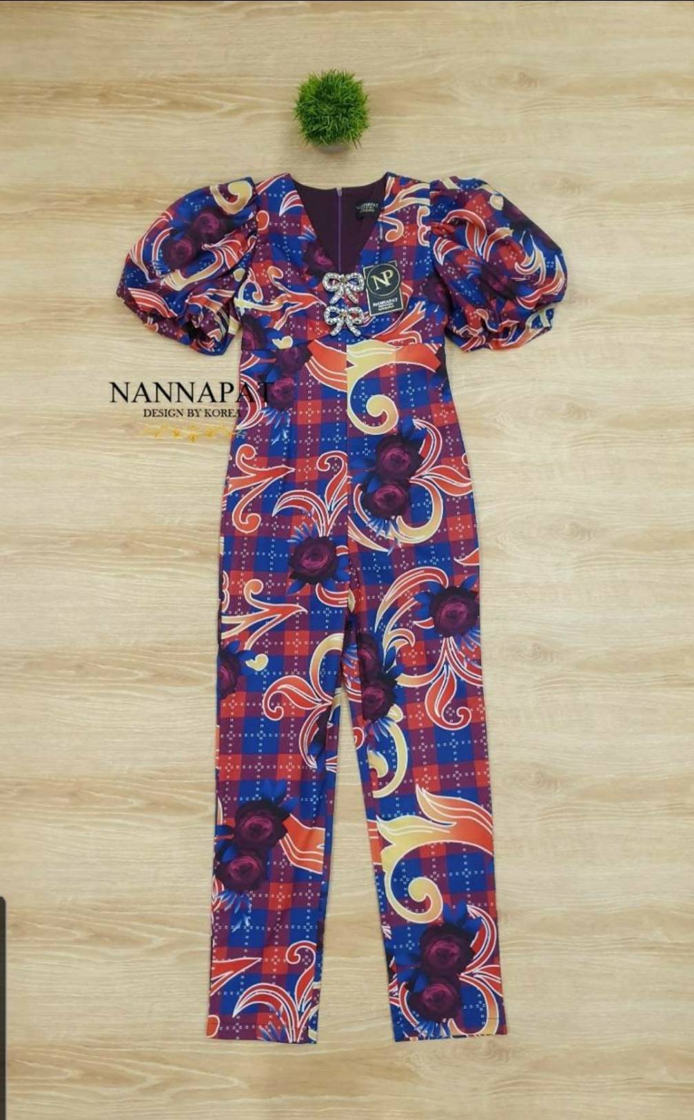 จั้มสูทงานซิปหลังแต่งโบว์เพชรที่อก