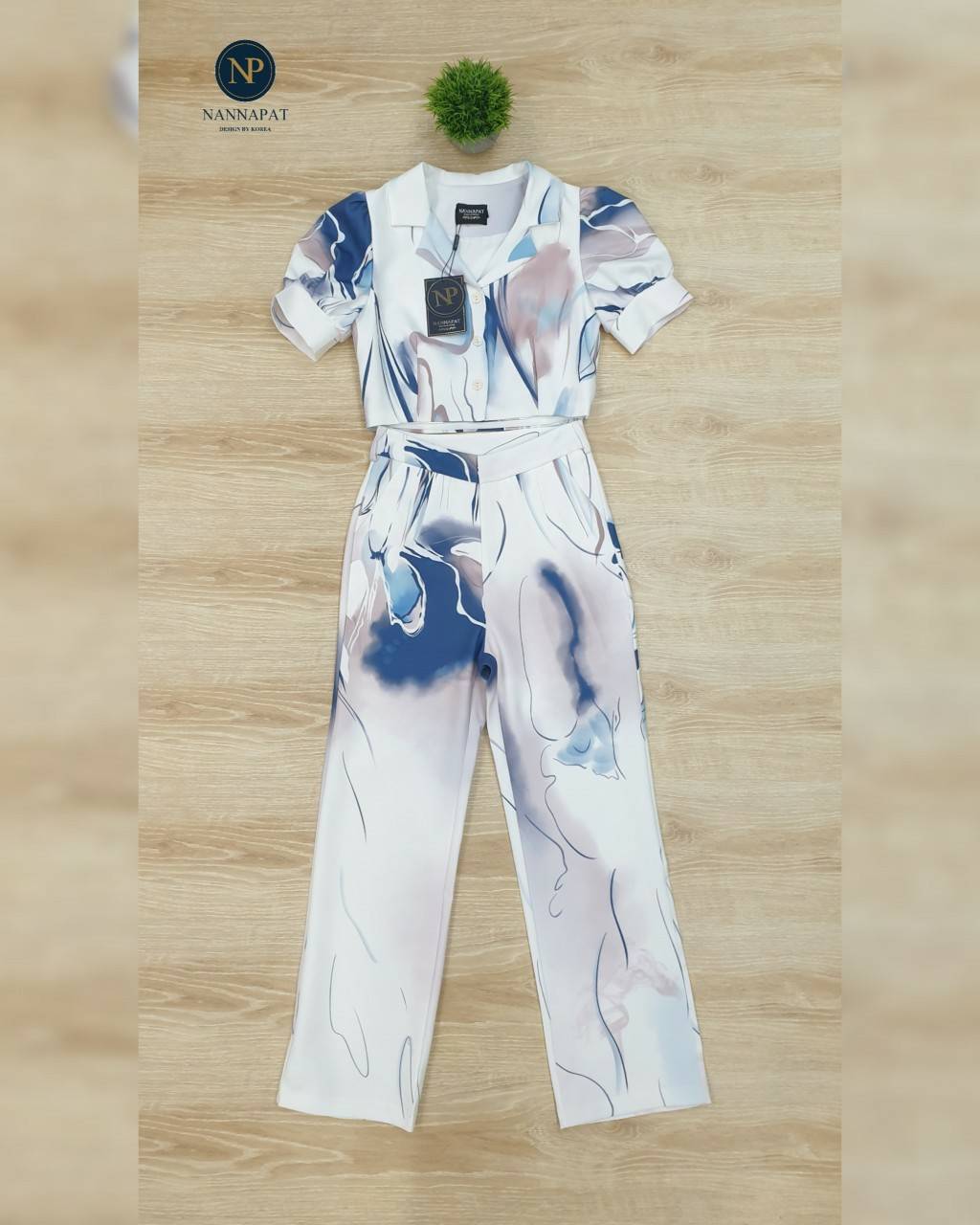 เสื้อกระดุมหน้ากางเกงมีกระเป๋าข้าง