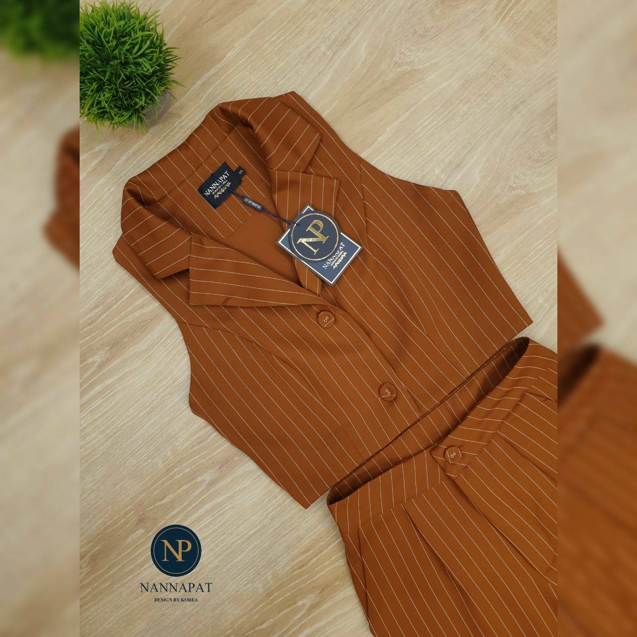 เสื้อแขนกุด คอปกกระดุมหน้า