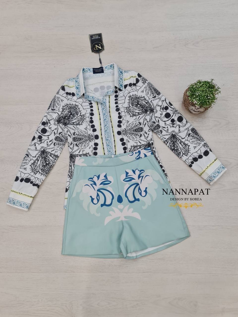 เสื้อเชิ้ตแขนยาวกระดุมหน้า