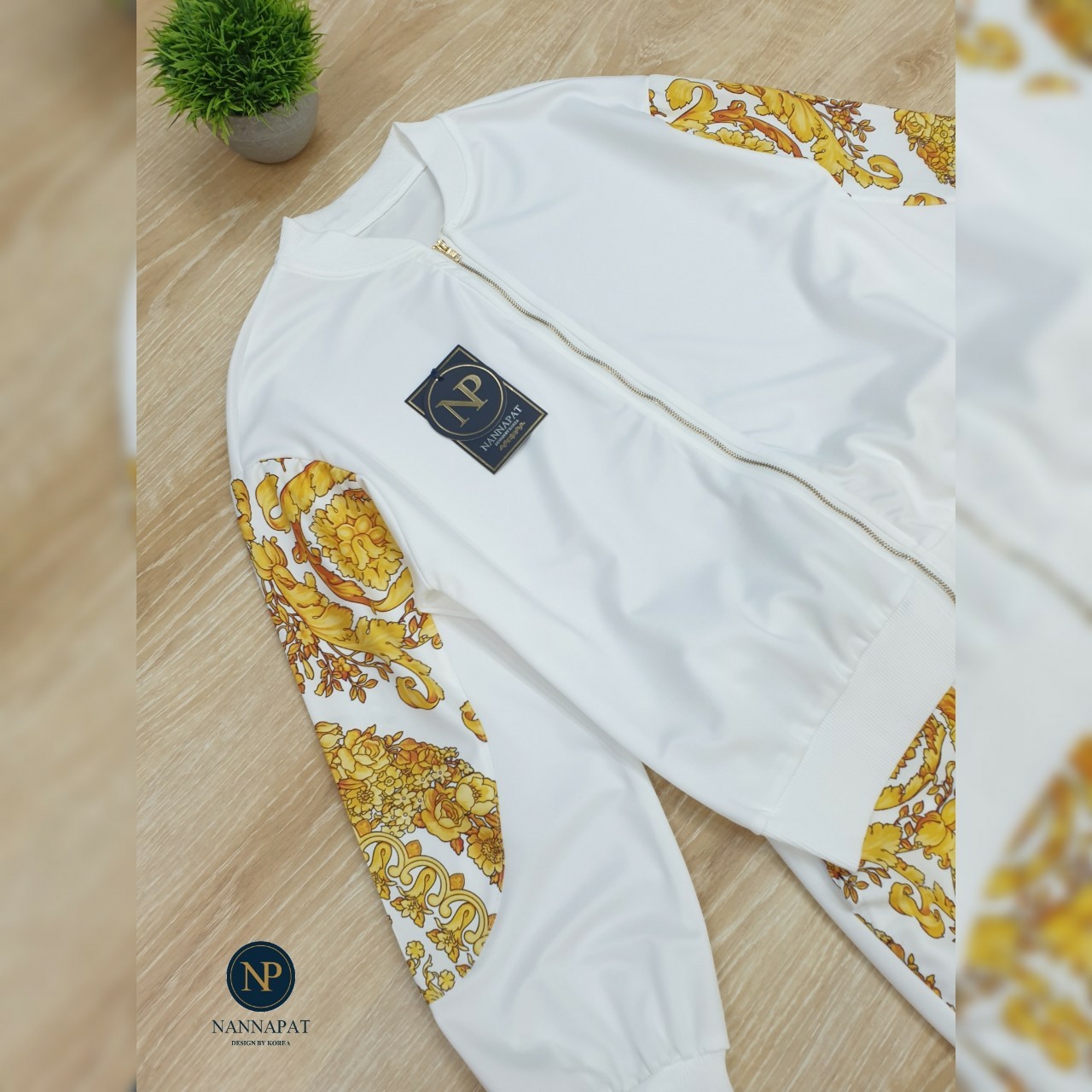 เสื้อซิปหน้าสีทองกางเกงเอวสม็อค