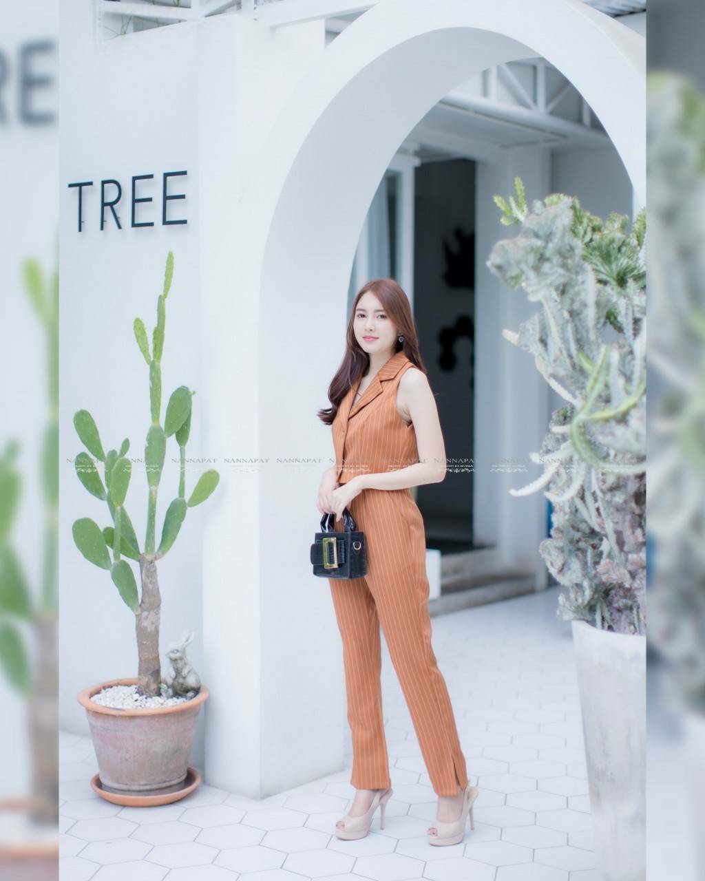 เสื้อแขนกุด คอปกกระดุมหน้า
