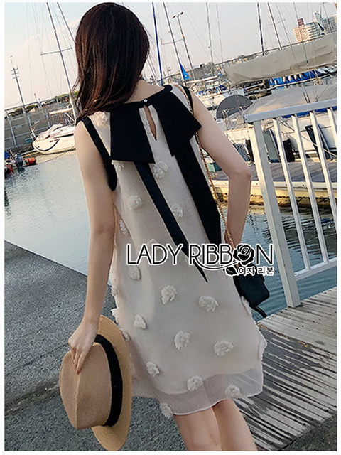 Dress เดรสแขนกุดผ้าลินินสีครีมปักพู่