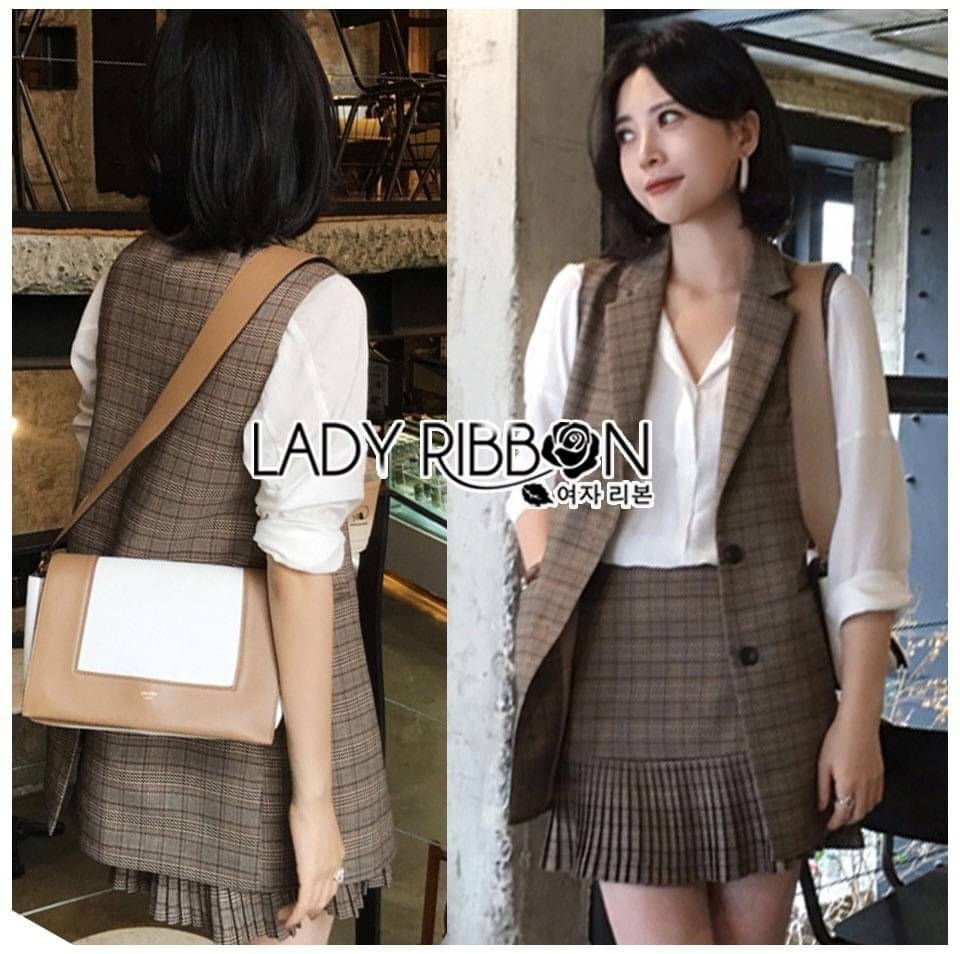 เซ็ตเสื้อสูทแขนกุดและกระโปรงแบบเข้าชุด