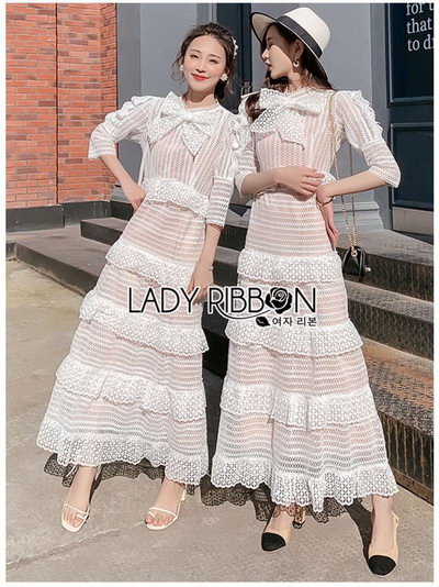 เดรสยาวผ้าลูกไม้สีขาวตกแต่งระบายมีเลเยอร์และริบบิ้น