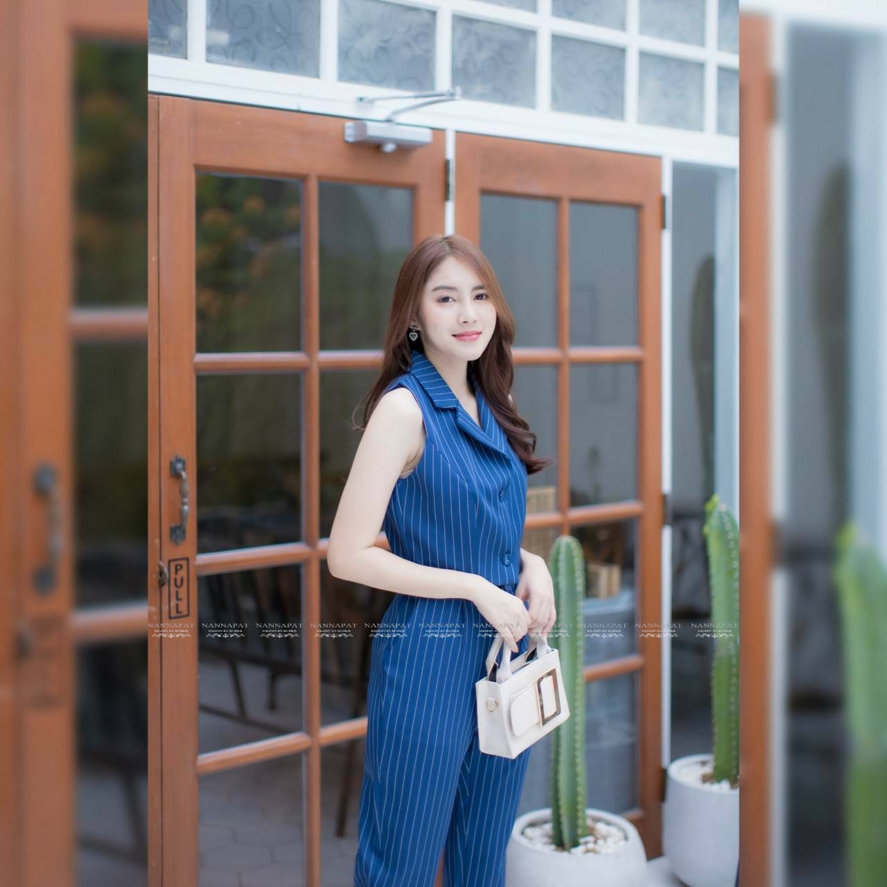 เสื้อแขนกุด คอปกกระดุม