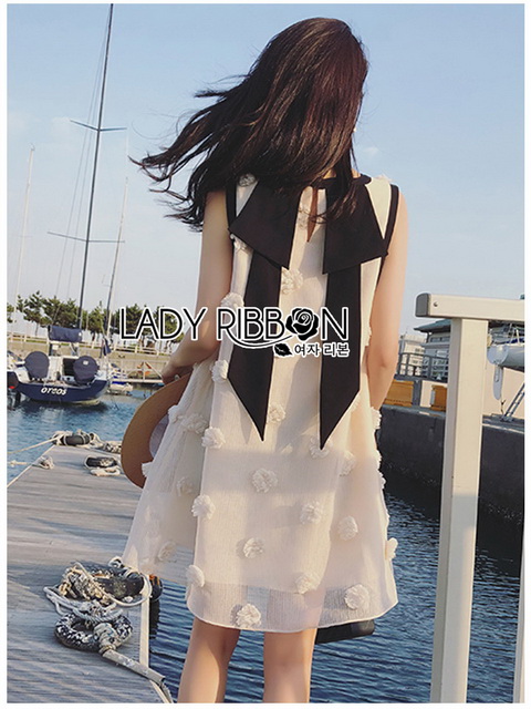 Dress เดรสแขนกุดผ้าลินินสีครีมปักพู่