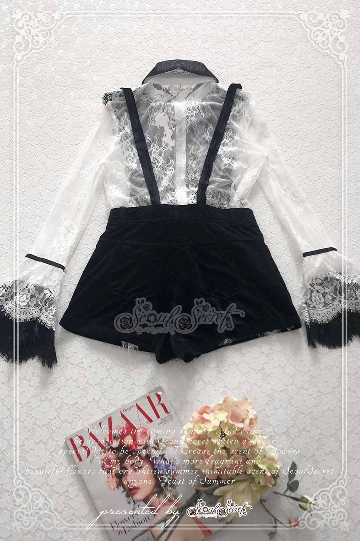 เสื้อทรงแขนยาวเป็นงานเนื้อผ้าลูกไม้แบบโปร่งสีขาว