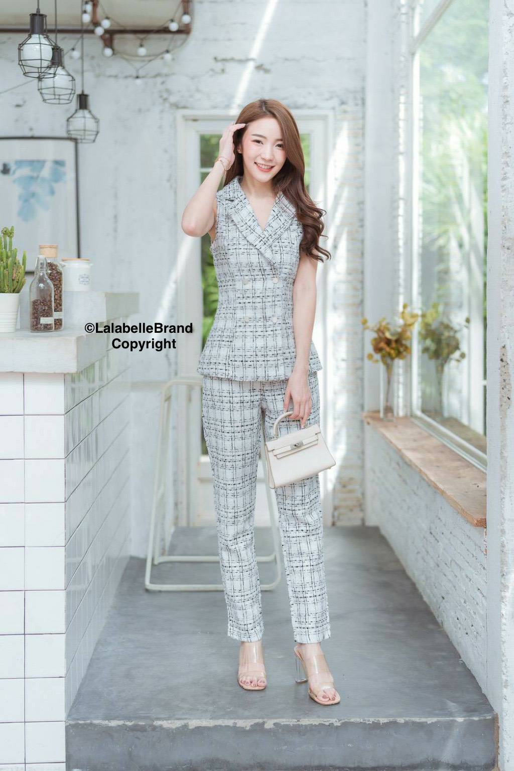 ผ้าดิ้นวิ้งเสื้อสูทแขนกุดคอปกกระดุมหน้า