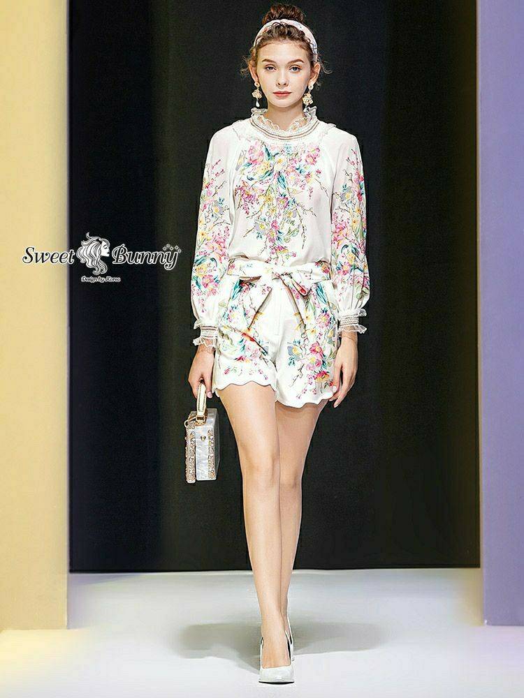 เสื้อคอตั้งขอบยางยืดระบาย
