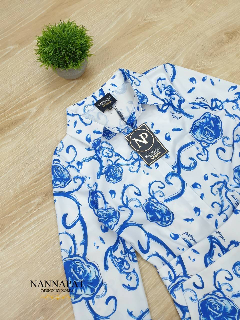 เสื้อแขนยาวคอปกกระดุมหน้า