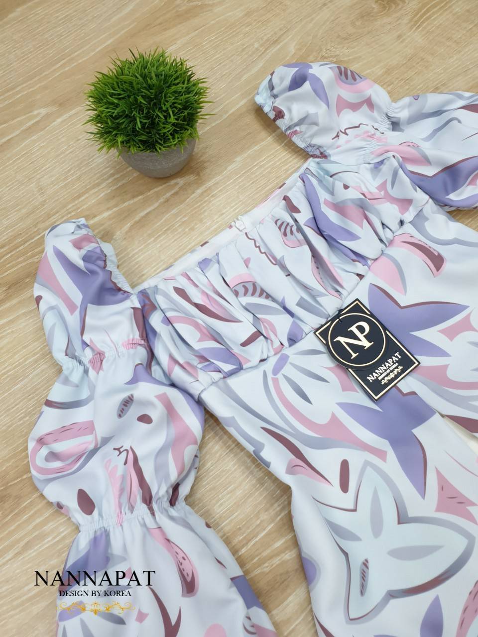 เสื้อผ่าหน้า ช่วงแขนเป็นสม็อค