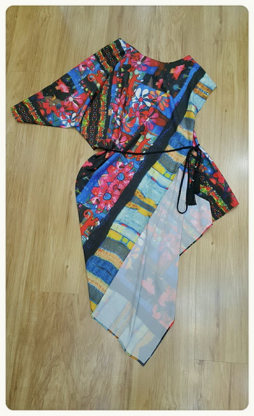 เสื้อทรงสวยเก๋แขนเสื้อทำสั้นข้างยาวข้าง