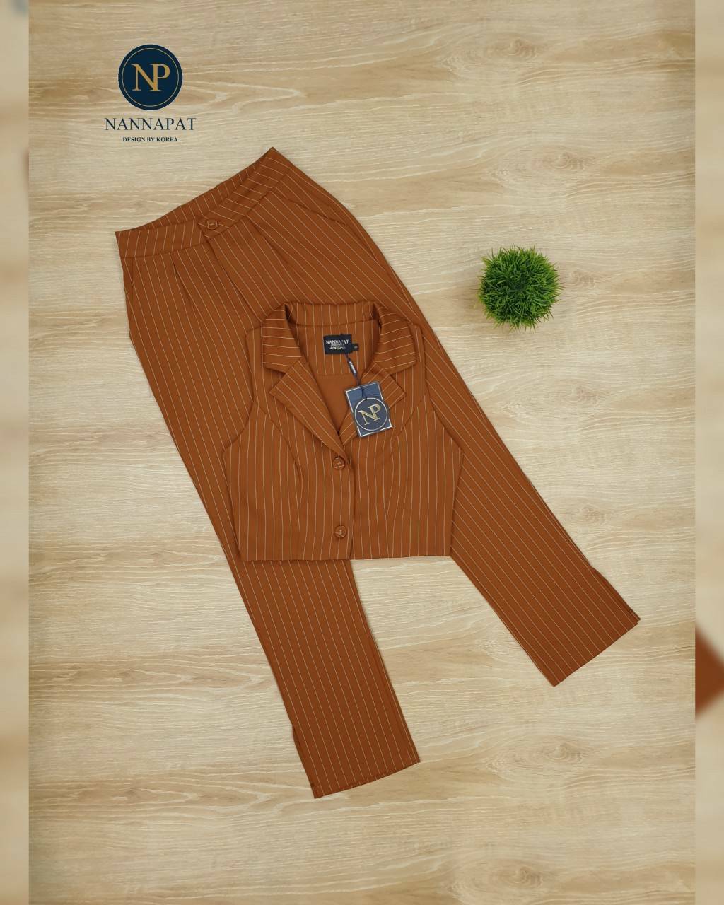 เสื้อแขนกุด คอปกกระดุมหน้า