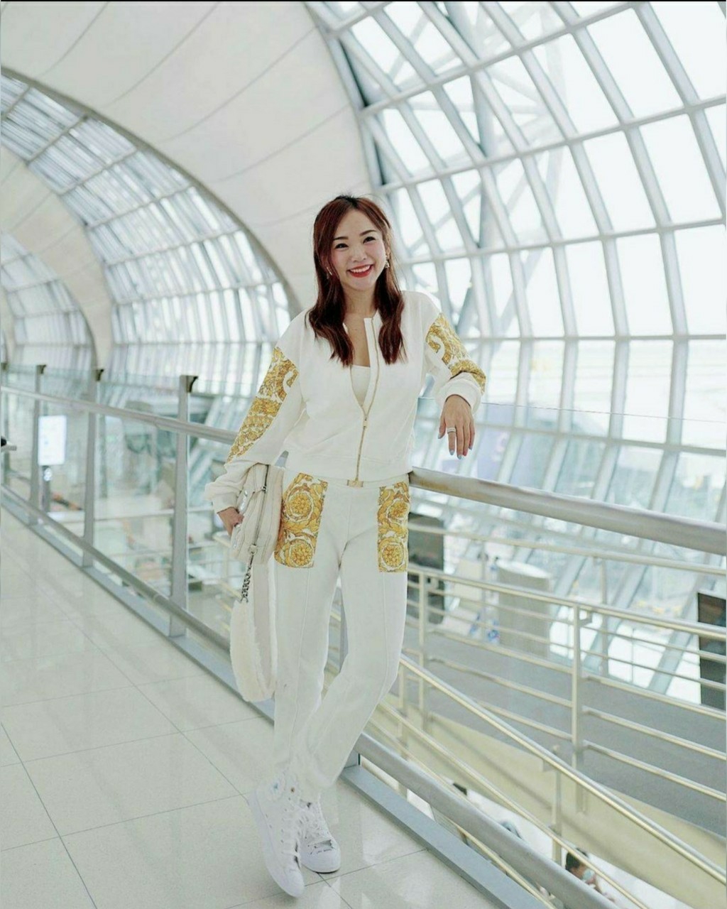 เสื้อซิปหน้าสีทองกางเกงเอวสม็อค