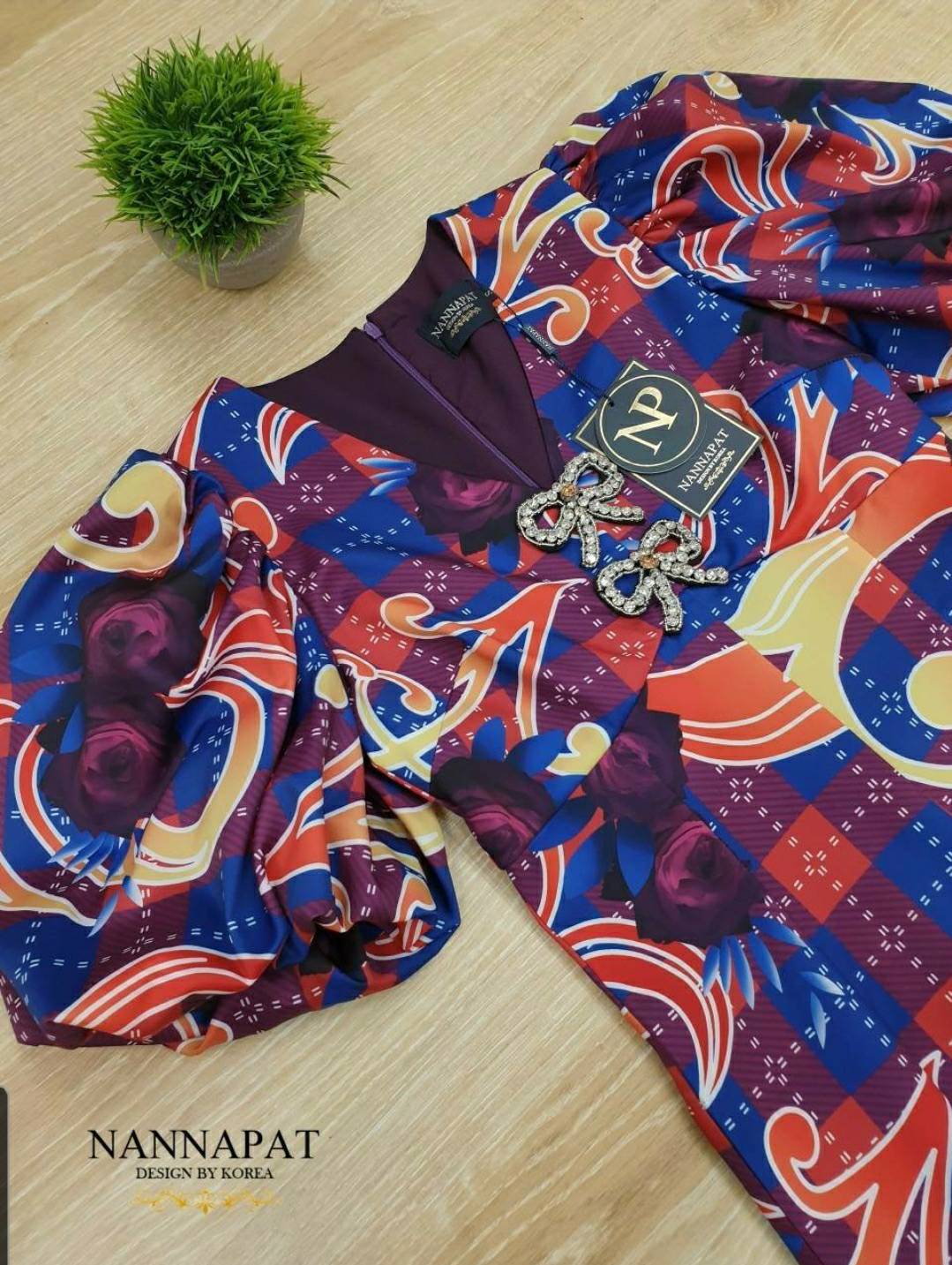 จั้มสูทงานซิปหลังแต่งโบว์เพชรที่อก