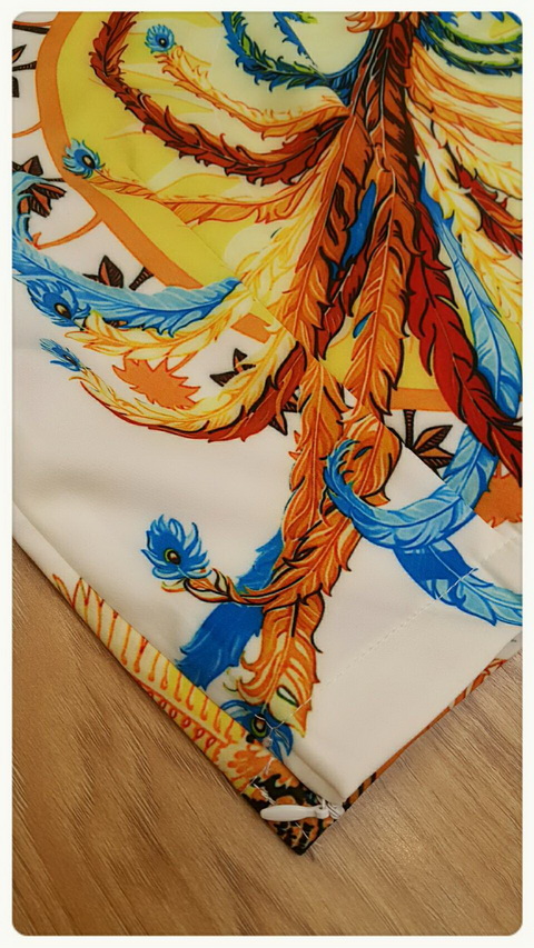 งานพิมพ์ลายนกยูงเสื้อคอกลมแขนสั้น กางเกงเอวขอบทรงกระบอก