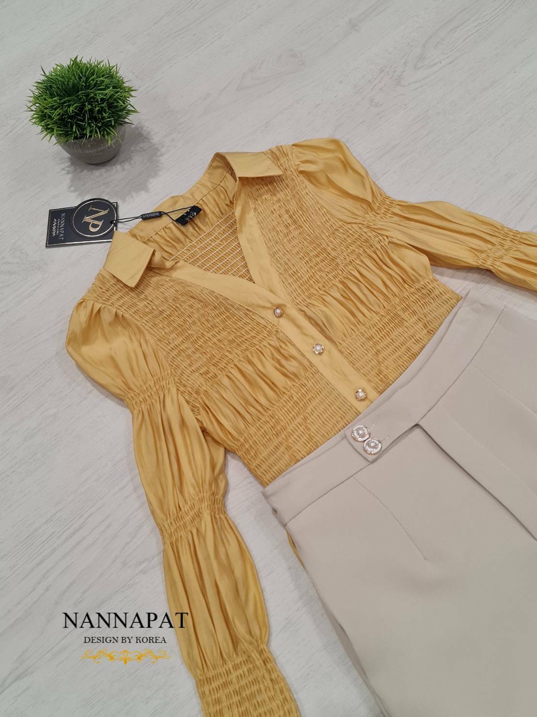 เสื้อกระดุมหน้า ช่วงตัวเป็นสม็อค