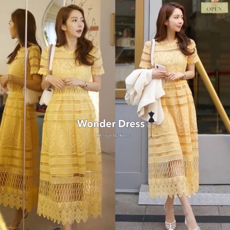 เดรสลูกไม้สีเหลืองฉลุลายสวยหรู