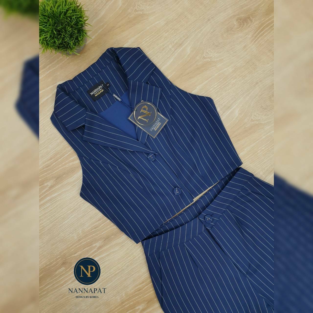 เสื้อแขนกุด คอปกกระดุม