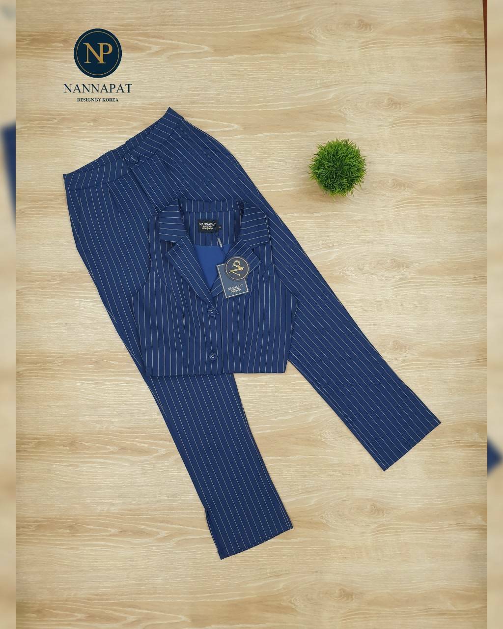 เสื้อแขนกุด คอปกกระดุม