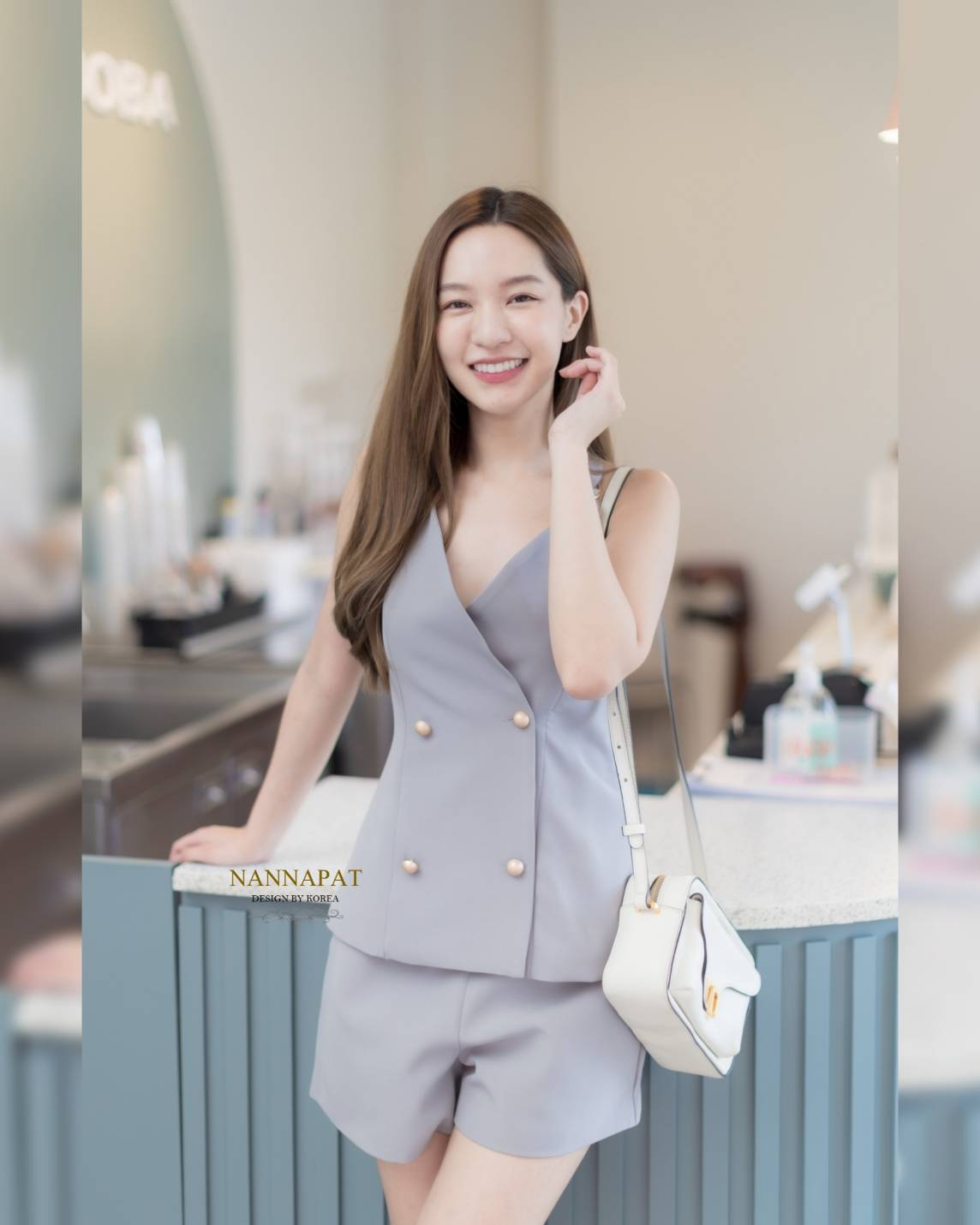 เสื้อกระดุมหน้า แต่งห่วงที่ไหล่