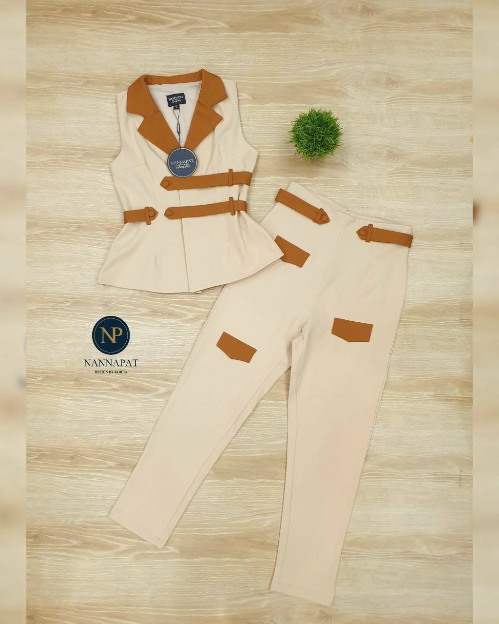 เสื้อแขนกุด กระดุมหน้า