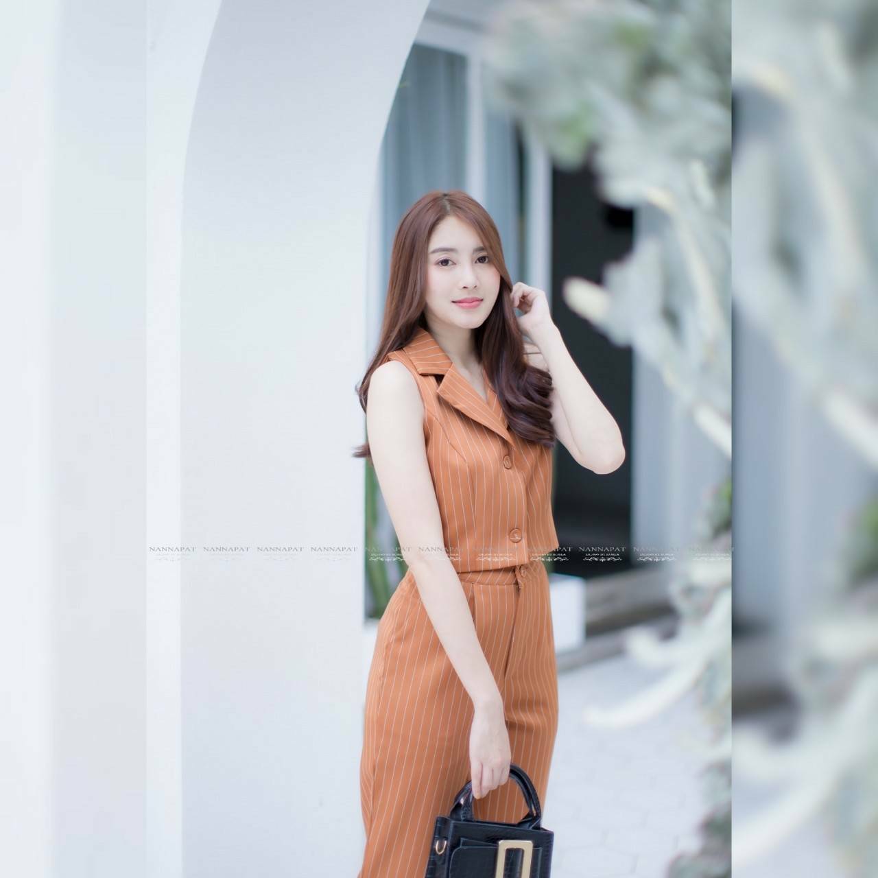 เสื้อแขนกุด คอปกกระดุมหน้า