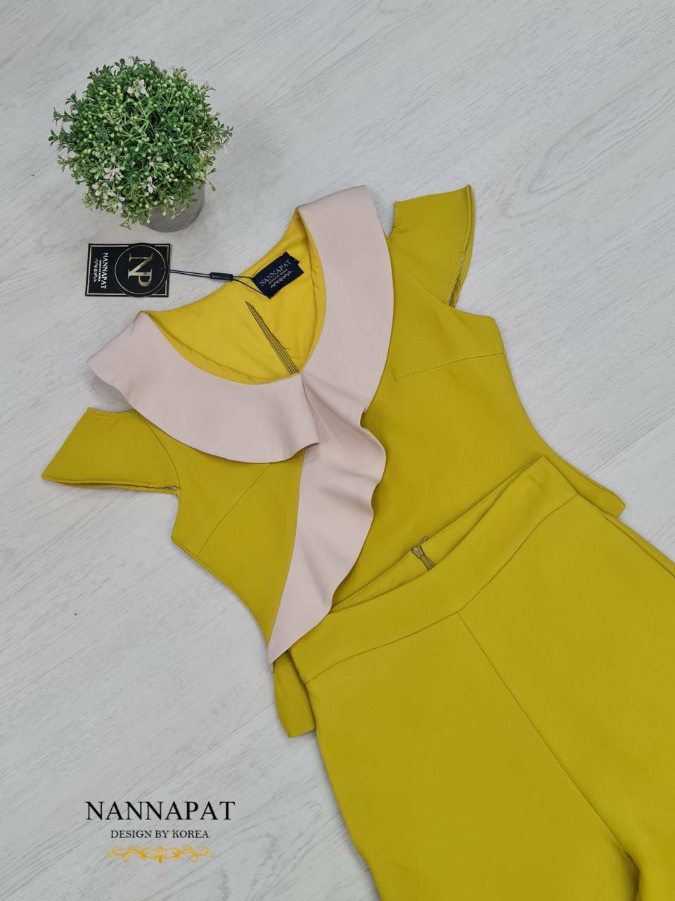 เสื้อซิปหลัง แต่งระบายน่ารัก แขนล้ำ