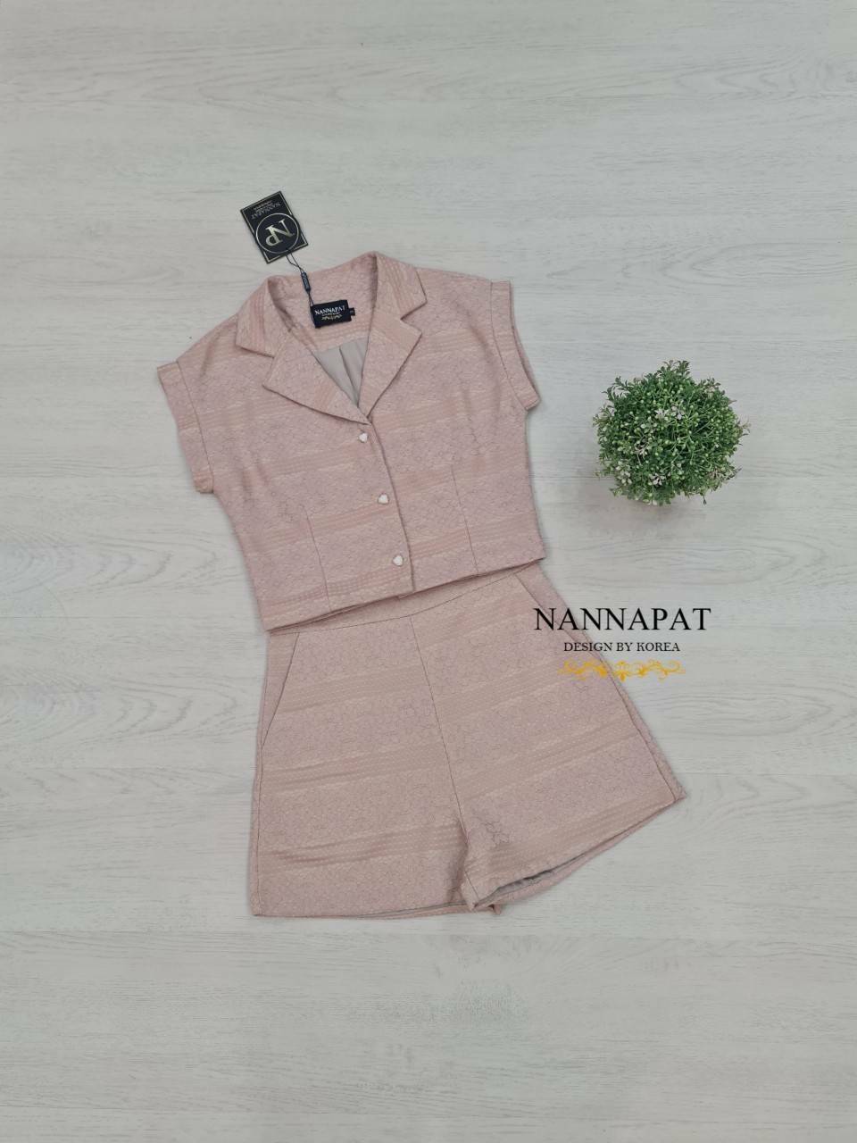 เสื้อซิปข้างแต่งกระดุม