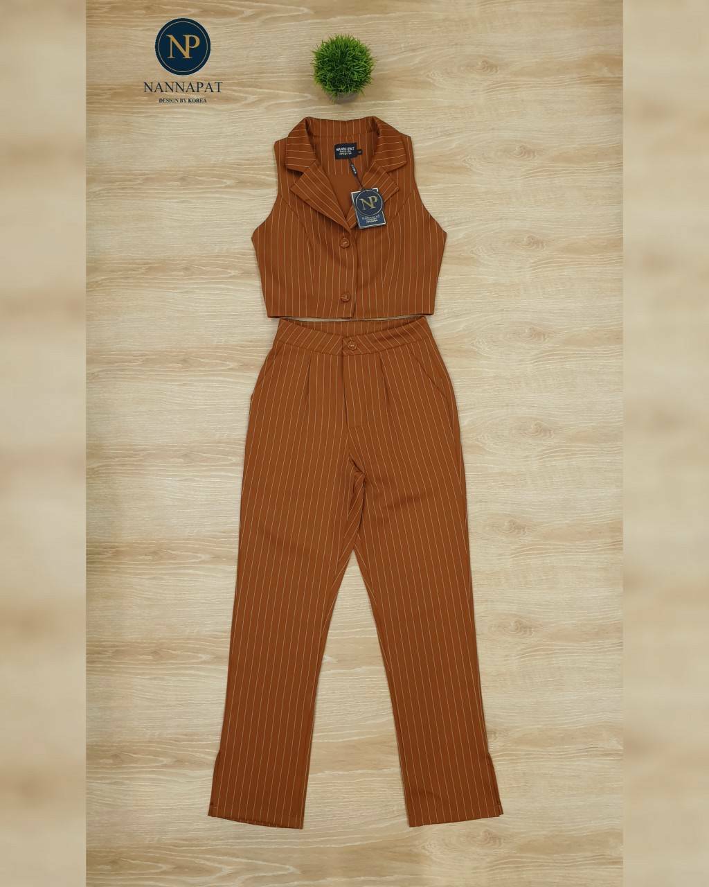 เสื้อแขนกุด คอปกกระดุมหน้า