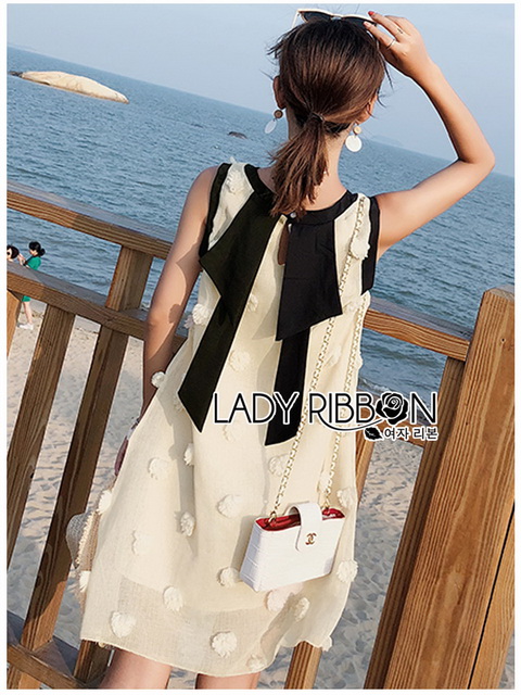 Dress เดรสแขนกุดผ้าลินินสีครีมปักพู่