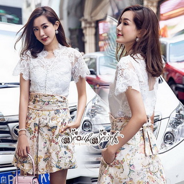 เสื้อเนื้อผ้าทอลายลูกไม้ฉลุลายโทนสีขาว