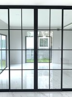 กั้นห้องรับแขกเพื่อติดแอร์ด้วยประตูบานเลื่อนสไตล์ยูโรป