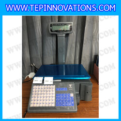 เครื่องชั่งดิจิตอลคำนวณราคา แบบมีคอเสาพร้อมพิมพ์สติ๊กเกอร์ พิกัด 15 กิโลกรัม ความละเอียด 5 กรัม ยี่ห้อ DIGI รุ่น SM-320P